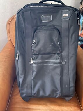 Tumi Black Rolling Suitcase with Front Pocket